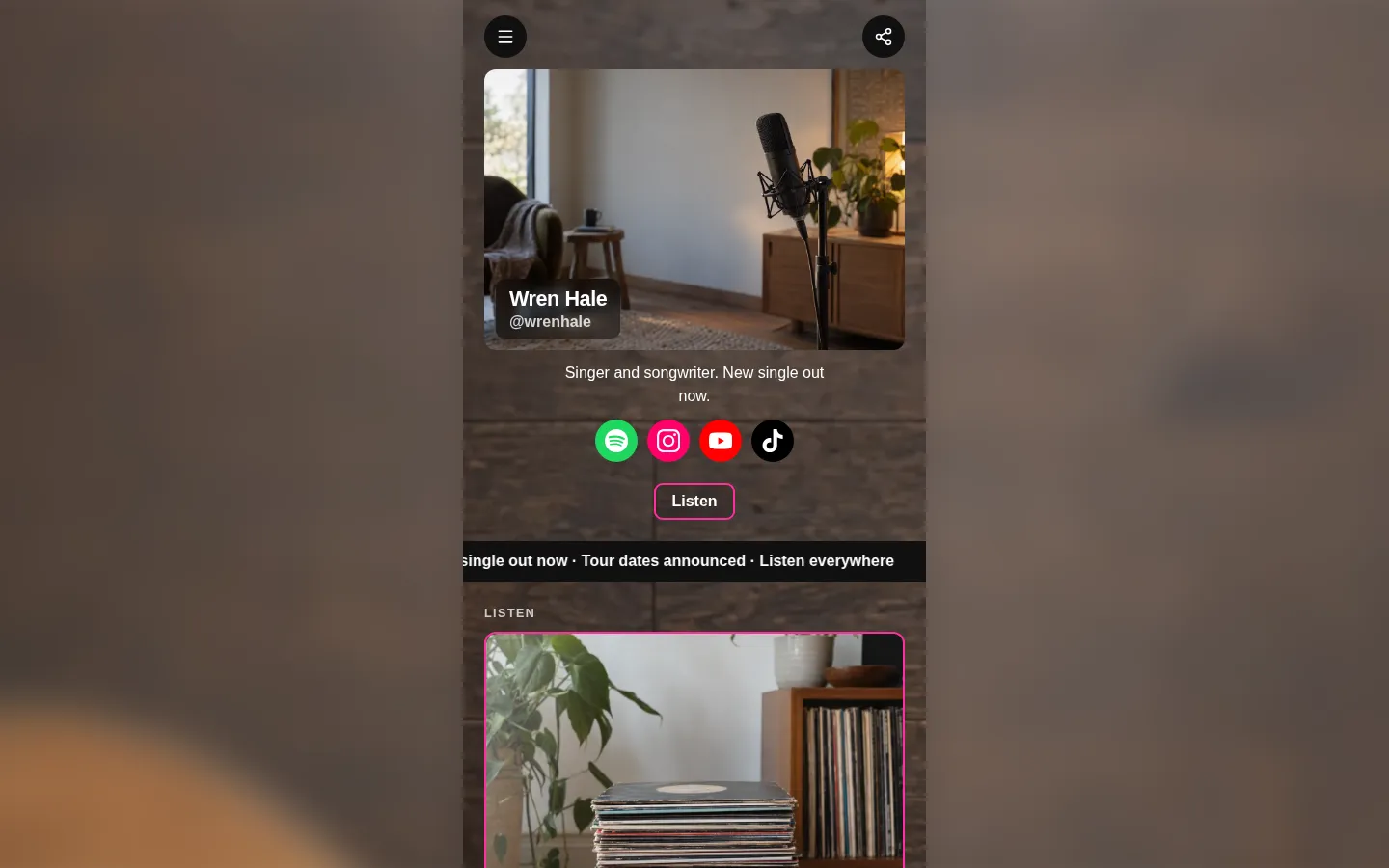 A musician's Keepp page on a laptop: a column with the artist's photo, streaming and social icons and latest release, with the page's own background blurred on either side