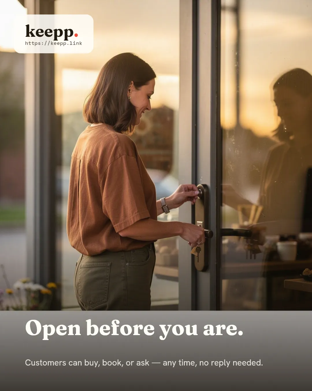 A small business owner unlocking her shop's front door at sunrise